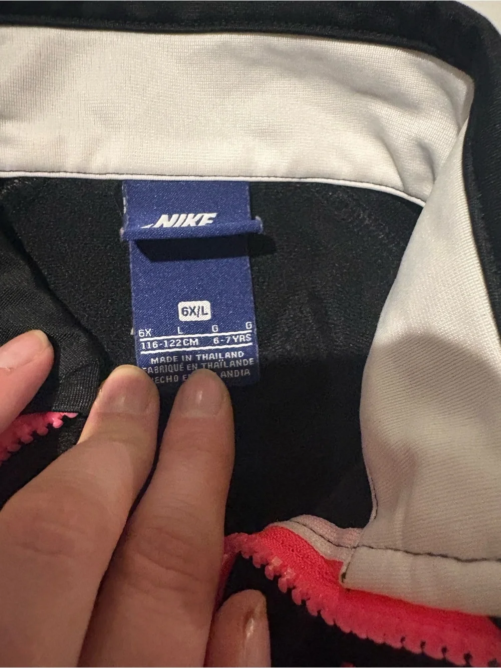 Nike Black and White Jacket with Pink Accents